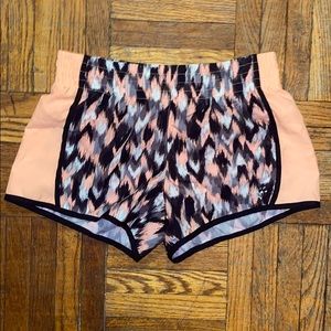 Coral pattern athletic shorts, attached underwear